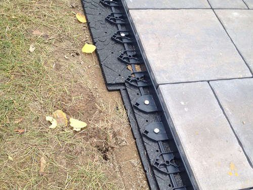 Step 4: Work outwards to the edge of Gator Base. Spike in Gator Edge restraint.